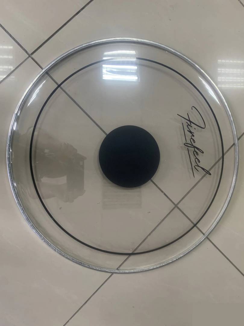 Double-ply oil drumhead for bass drum with black dot, 18"–22" (D076)