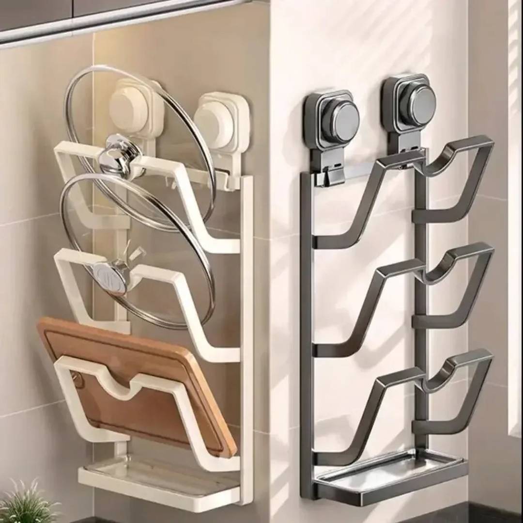 Wall-mounted holder for lids and cutting boards with drip tray