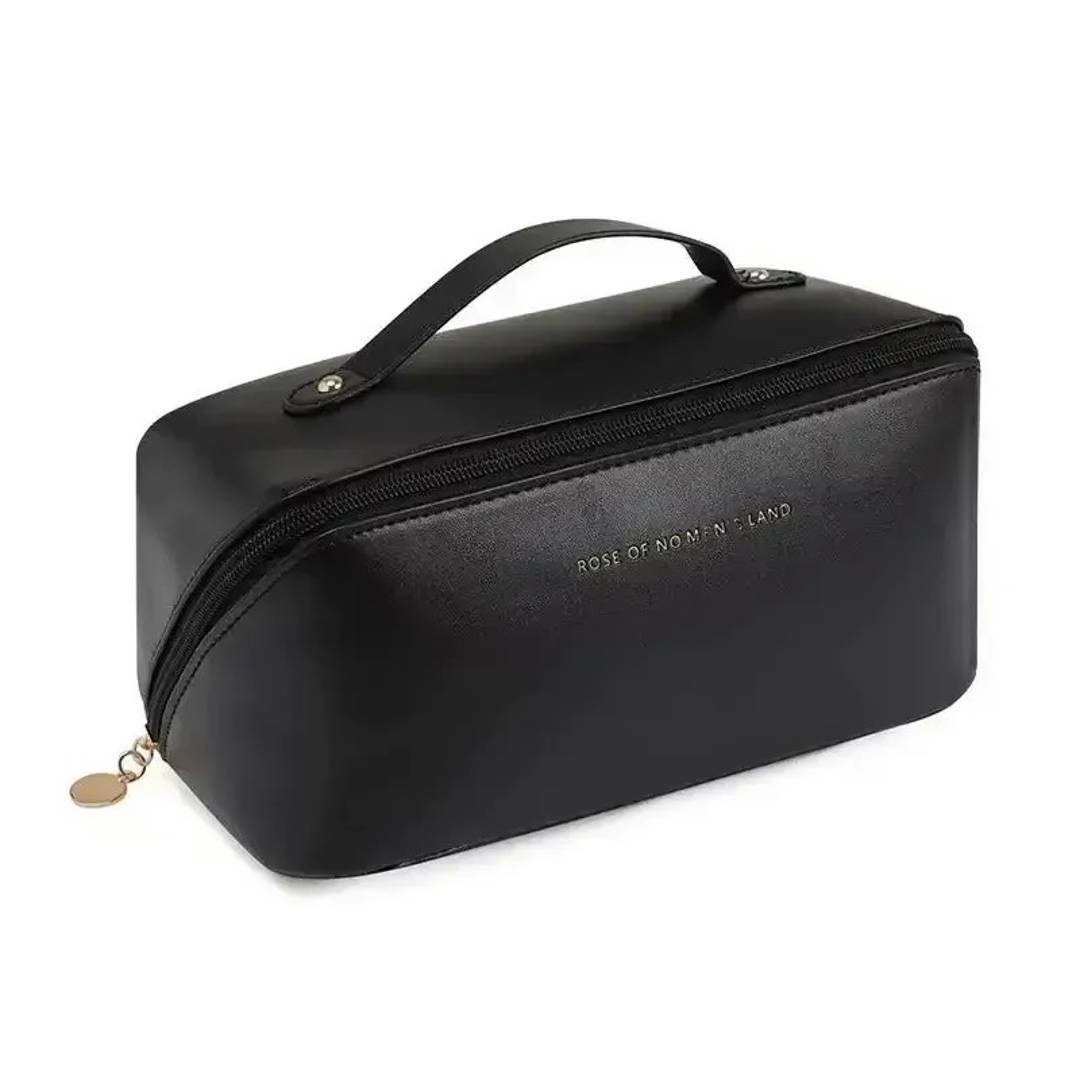 Travel toiletry bag with a wide opening and handle