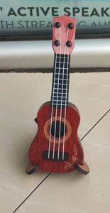 Mini ukulele za decu sa stalkom i trzalicom — Bor