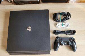 Sony PlayStation 4 Pro 1 TB + 10 igara, original (nije čipovan) — Beograd